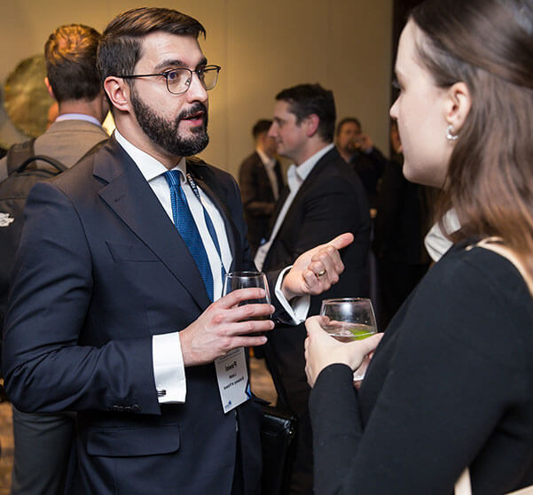 two people speaking at an energy dialogues event