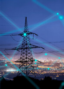 Night sky with power lines and blue connected graphics.