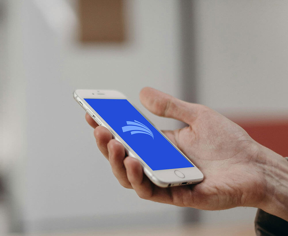 Hand holding phone with Energy Dialogues logo