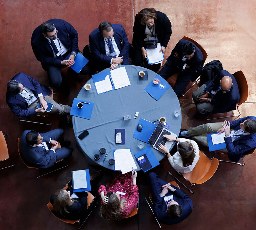 Overhead view of meeting at table